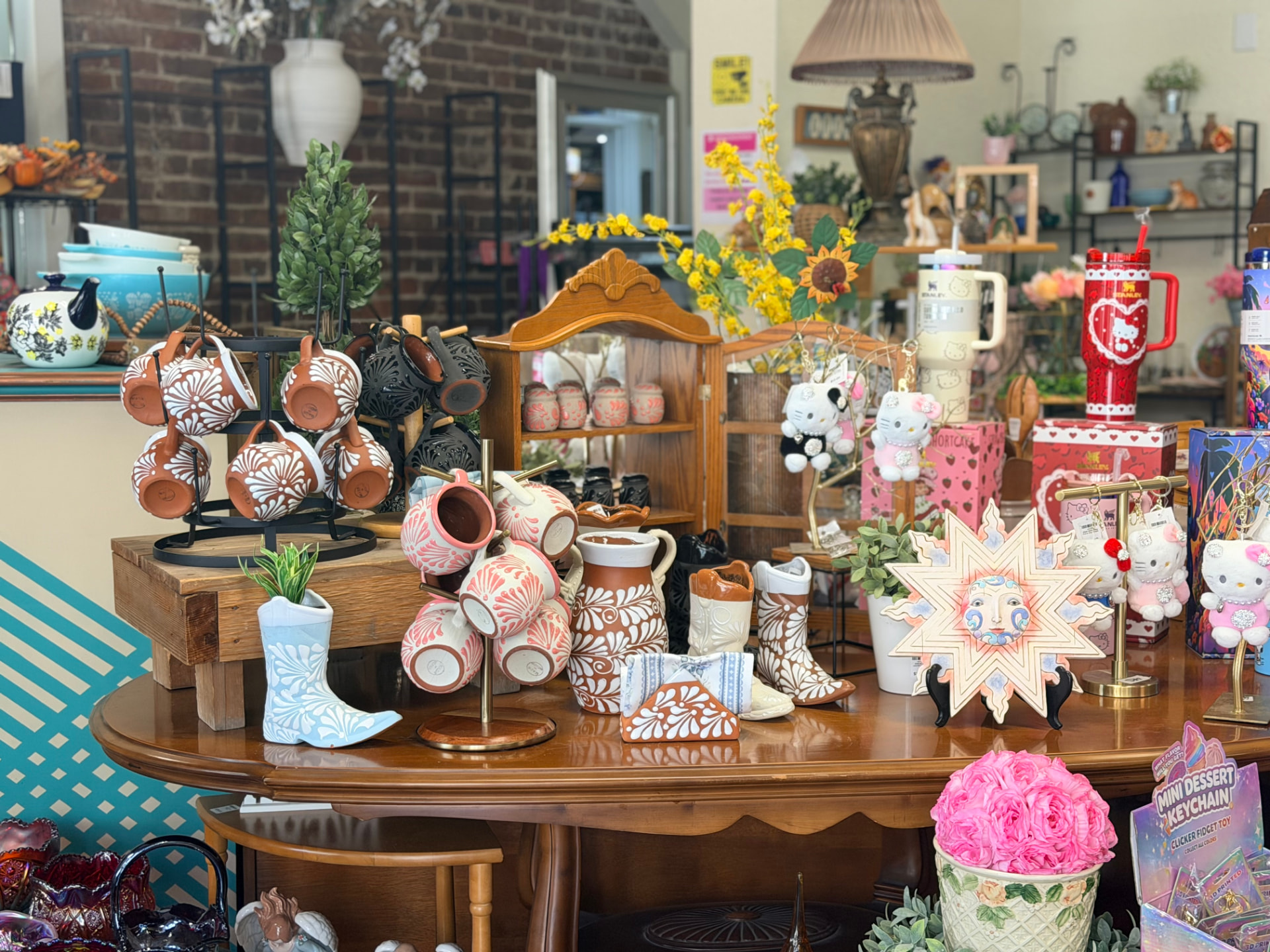 Timeless Elegance Vintage Store interior display with pottery, gifts, and collectibles