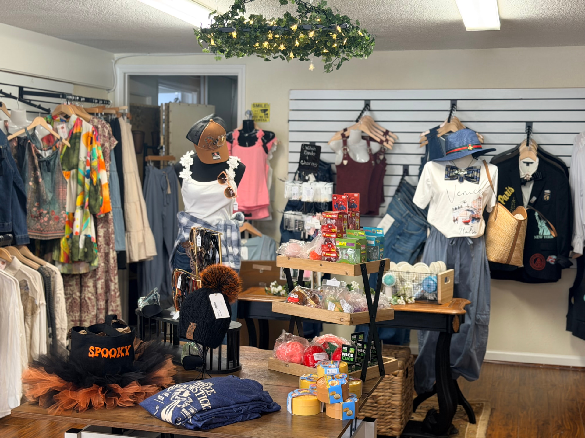 Clothing, accessories, and displays inside Timeless Elegance Vintage Store